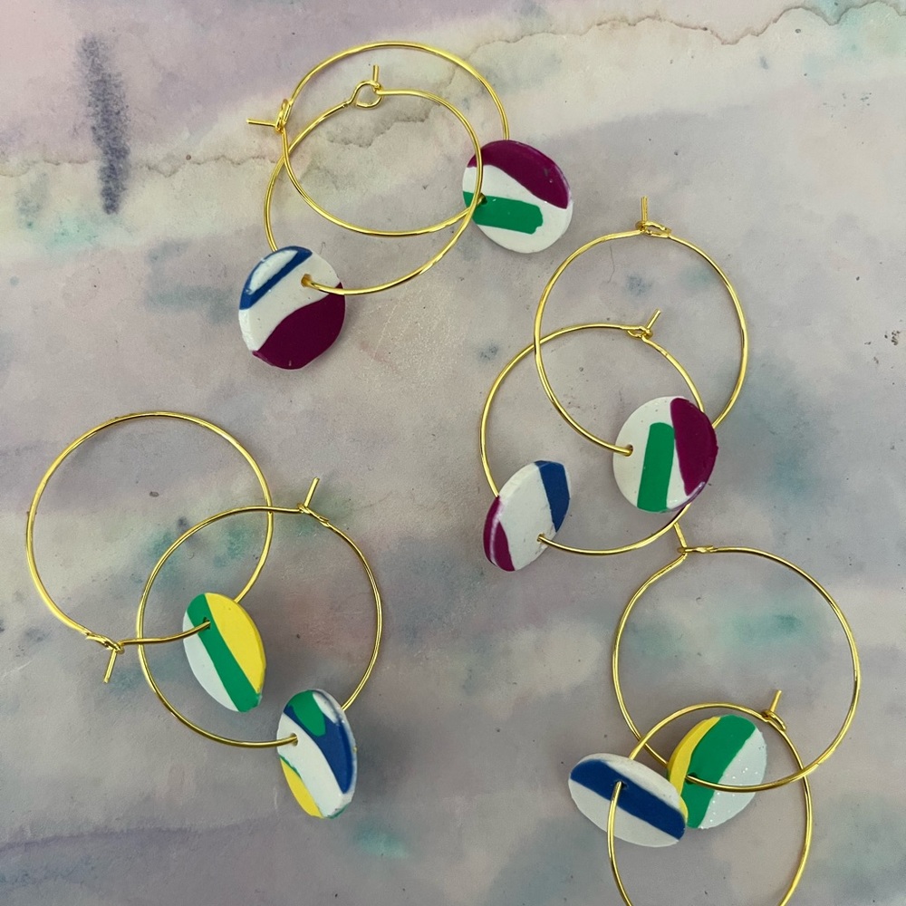 Super cute, hypoallergenic gold hoops with fun multicolor, glitter sparkle hoops